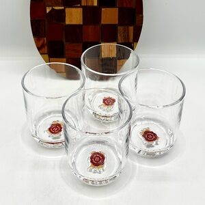 4 Jim Beam Whiskey Glasses, with emblem embedded in the bottom of the glass.